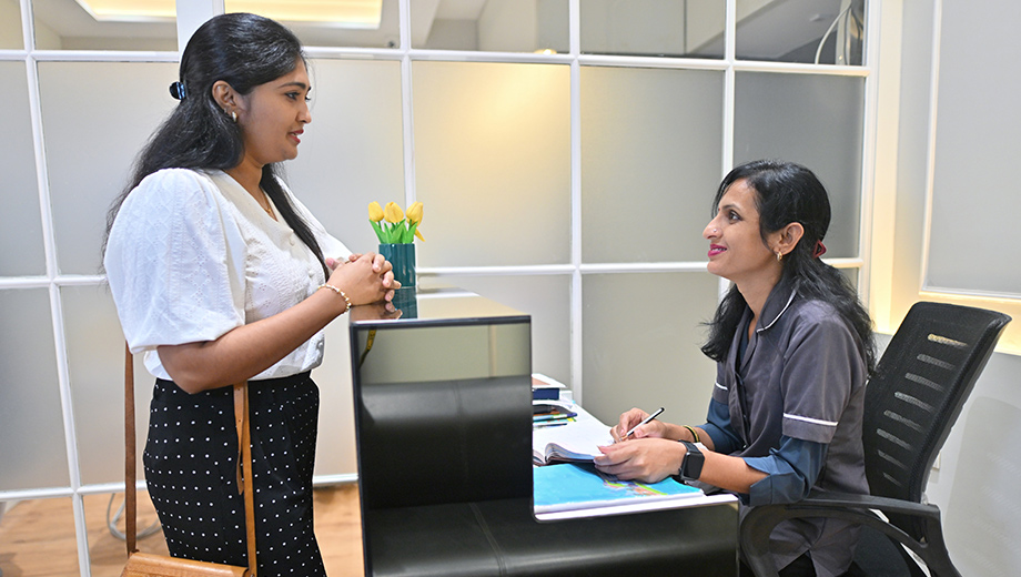 Women smiling at health care provider. 