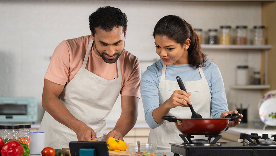 Man and woman in the kitchen.